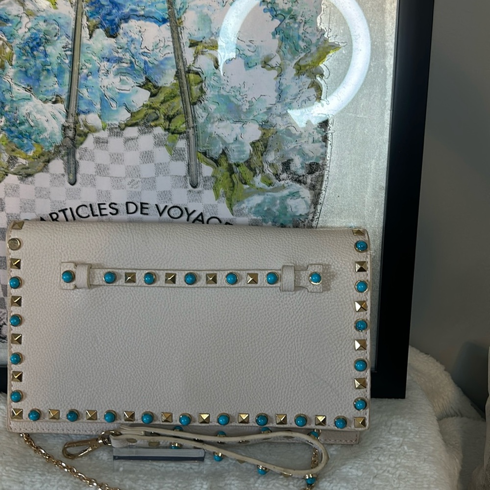 Urban expression tan with gold hardware and turquoise clutch wristlet Crossbody